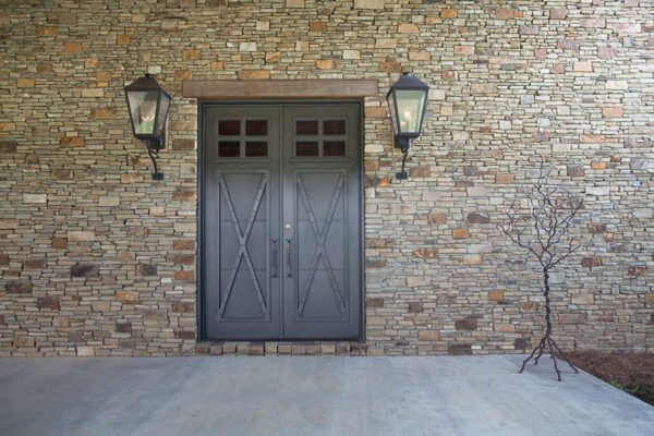 Classic stallo steel double door stone wall by Solara Custom Living