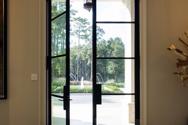 Low profile steel pivot door harlequin lp100 open by Solara Custom Living