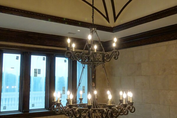 Classic iron chandelier vaulted ceiling by Solara Custom Living