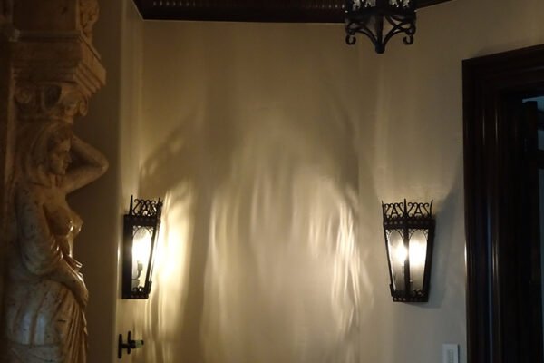 Classic iron wall sconces and pendant powder room by Solara Custom Living