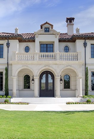 Classic steel arched entry doors mediterranean facade by Solara Custom Living