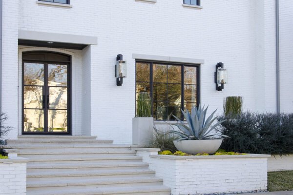 Low profile steel entry door sconces front steps by Solara Custom Living