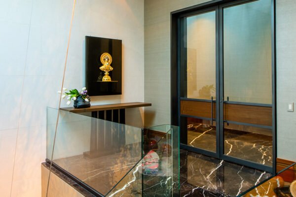 Low profile steel pocket sliding door interior by Solara Custom Living
