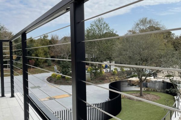 Modern steel cable railing deck view by Solara Custom Living
