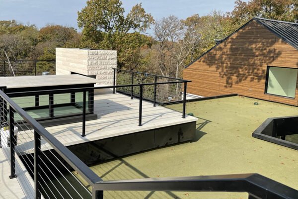 Modern steel cable railing green roof by Solara Custom Living