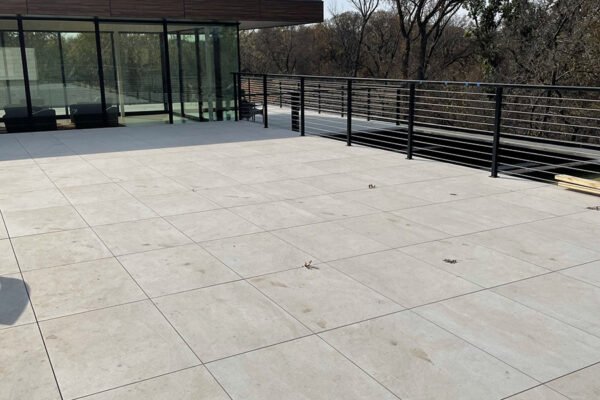 Modern steel cable railing rooftop terrace by Solara Custom Living