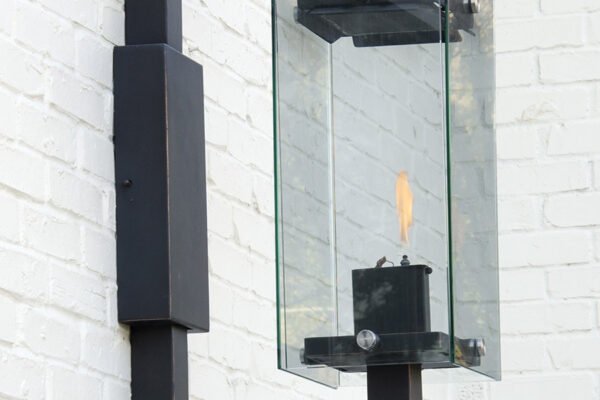 Modern steel glass wall sconce detail by Solara Custom Living