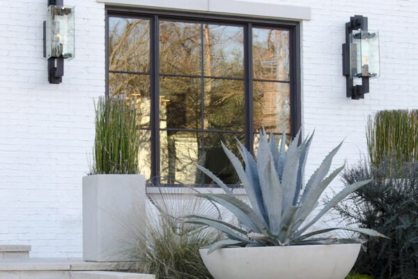Modern steel window wall sconces front steps by Solara Custom Living