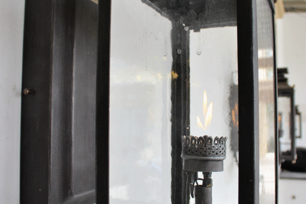Transitional steel wall lantern side view by Solara Custom Living