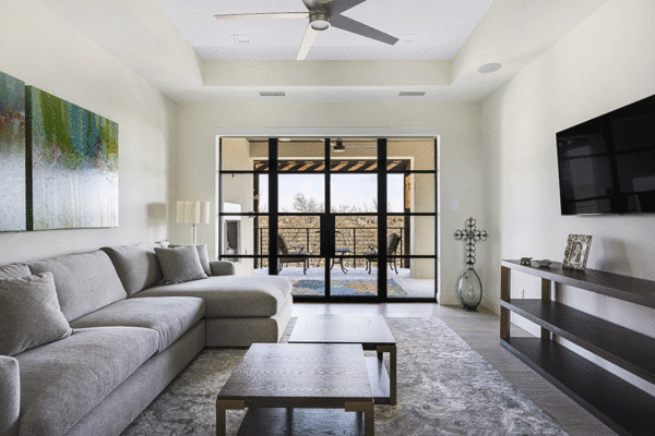 Jansen steel divided lite doors family room by Solara Custom Living