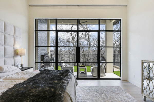 Jansen steel divided lite doors primary bedroom by Solara Custom Living