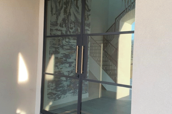 Jansen steel divided lite entry door glass by Solara Custom Living