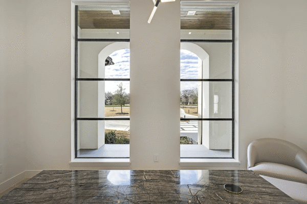 Jansen steel divided lite windows arched view by Solara Custom Living