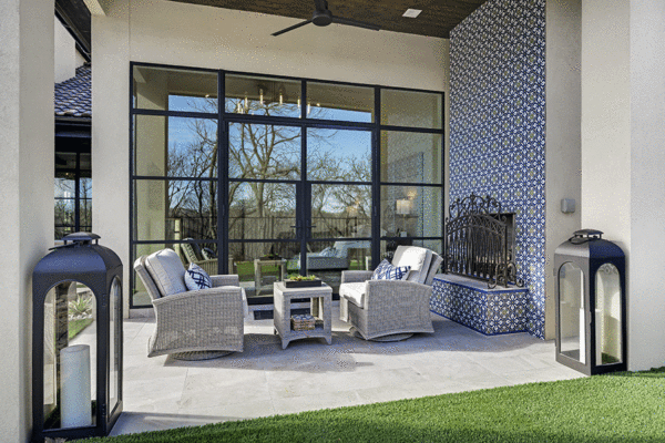 Jansen steel divided lite windows outdoor fireplace by Solara Custom Living
